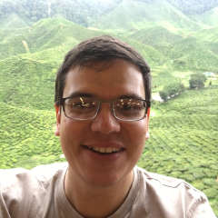 Selfie of me in front of a tea plantation in Malaysia